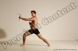 Underwear Fighting with axe Man White Muscular Short Brown Dynamic poses Academic